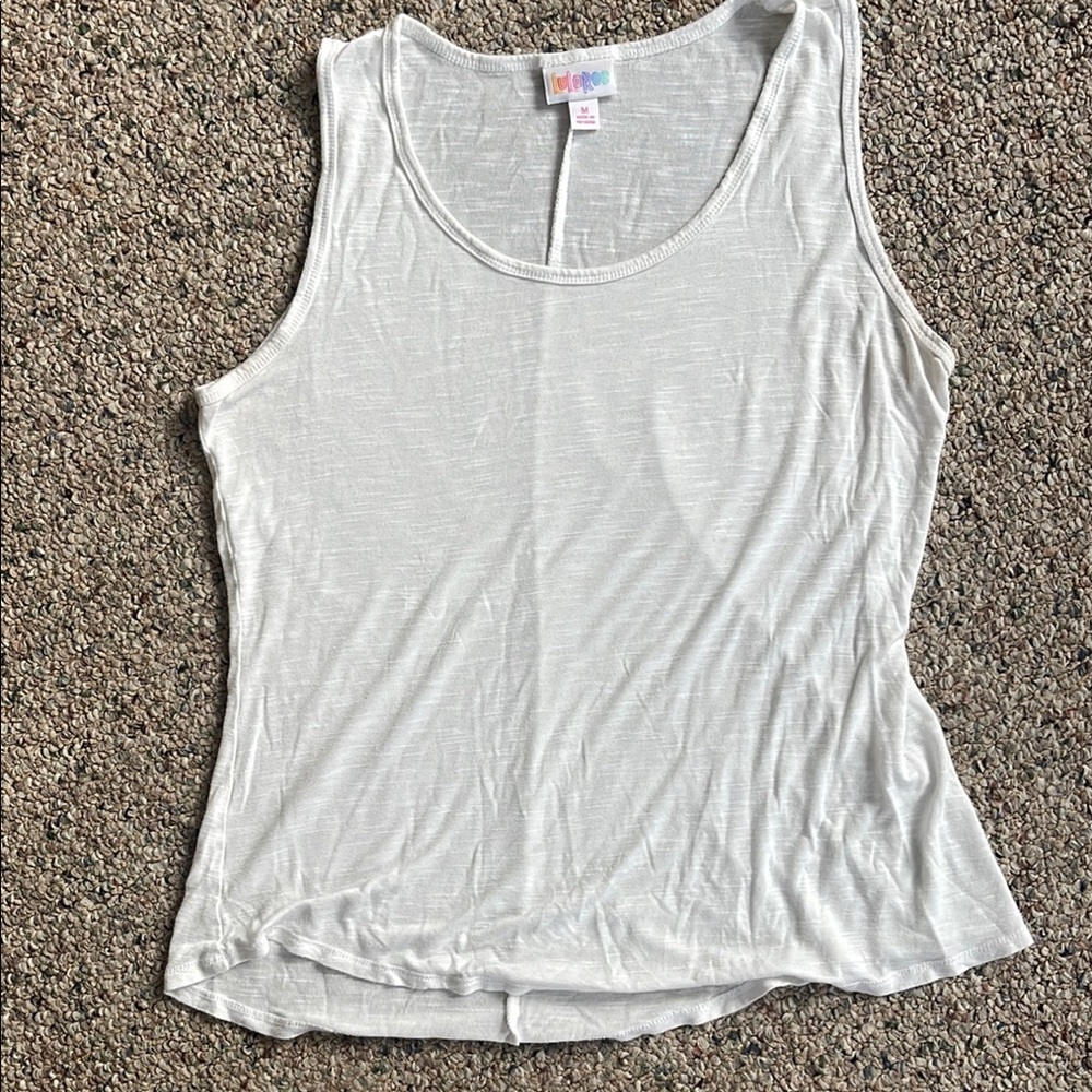 Woman’s Whitle Luloroe tank top.